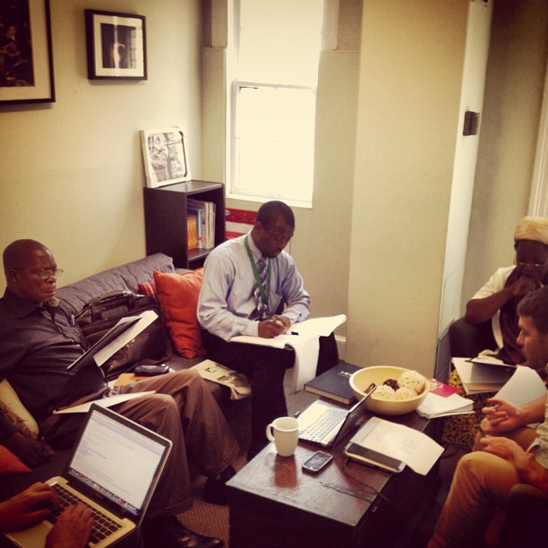 Father Benoit, Innocent, Sister Angelique, and Paul Ronan debriefing in Resolve office