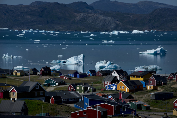 Icebergs from nearby glaciers float in the bay in Narsaq, Greenland.