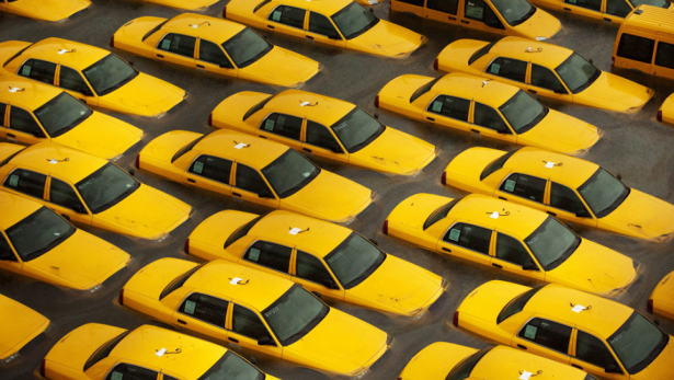 Taxis sit in a flooded lot in Hoboken, New Jersey, after Hurricane Sandy devastated the region.