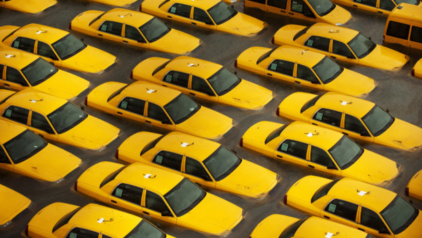 Taxis sit in a flooded lot in Hoboken, New Jersey, after Hurricane Sandy devastated the region. 