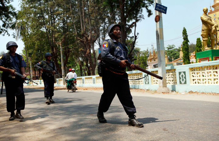 Police repsond to Myanmar Riot.