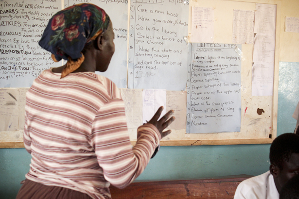 Florence refers to the teaching aids she made after participating in the Teacher Exchange team teaching.