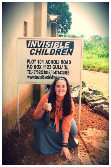 Emma poses outside of Invisible Children's Gulu office