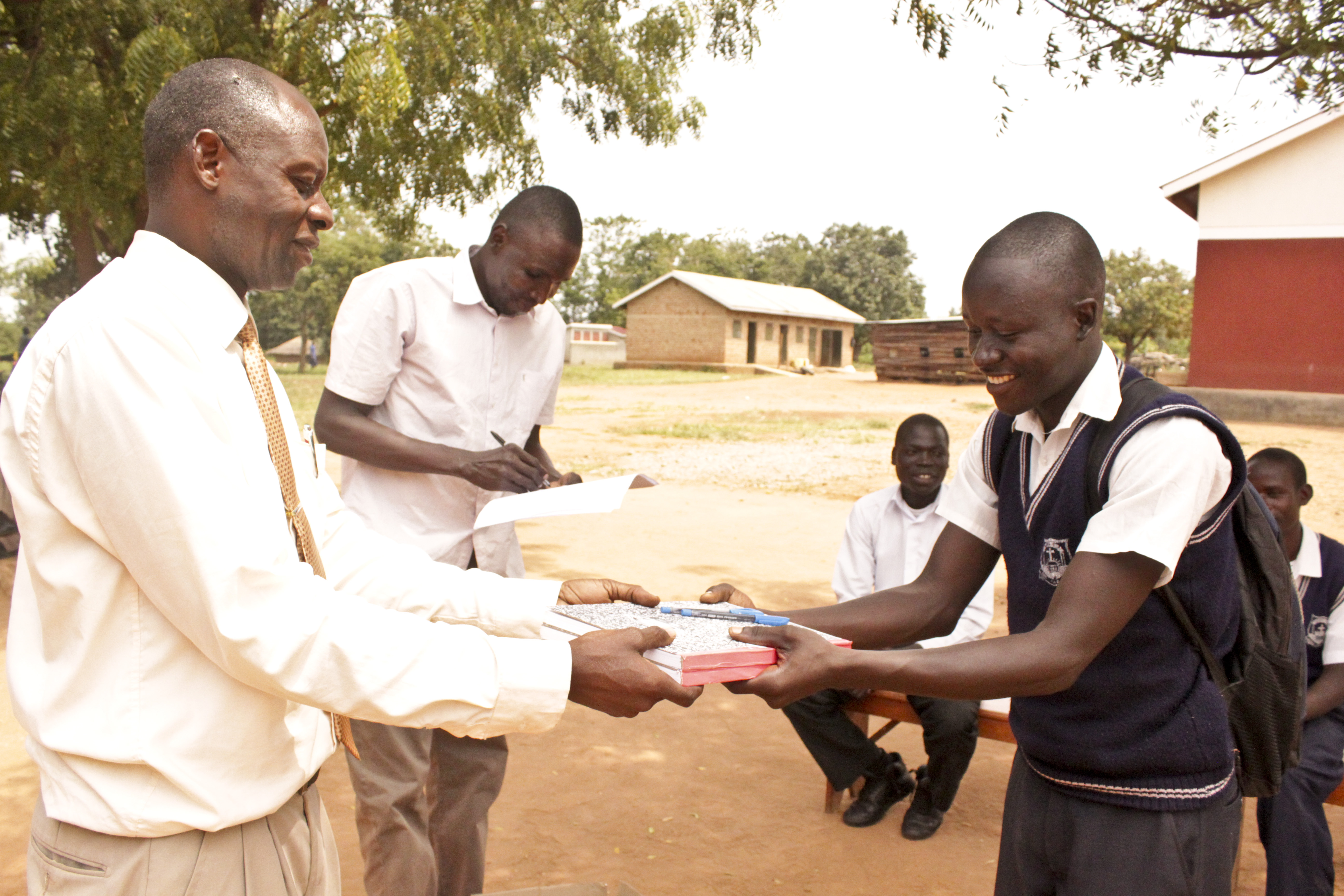 Distributing the prizes for participation in the essay contest.