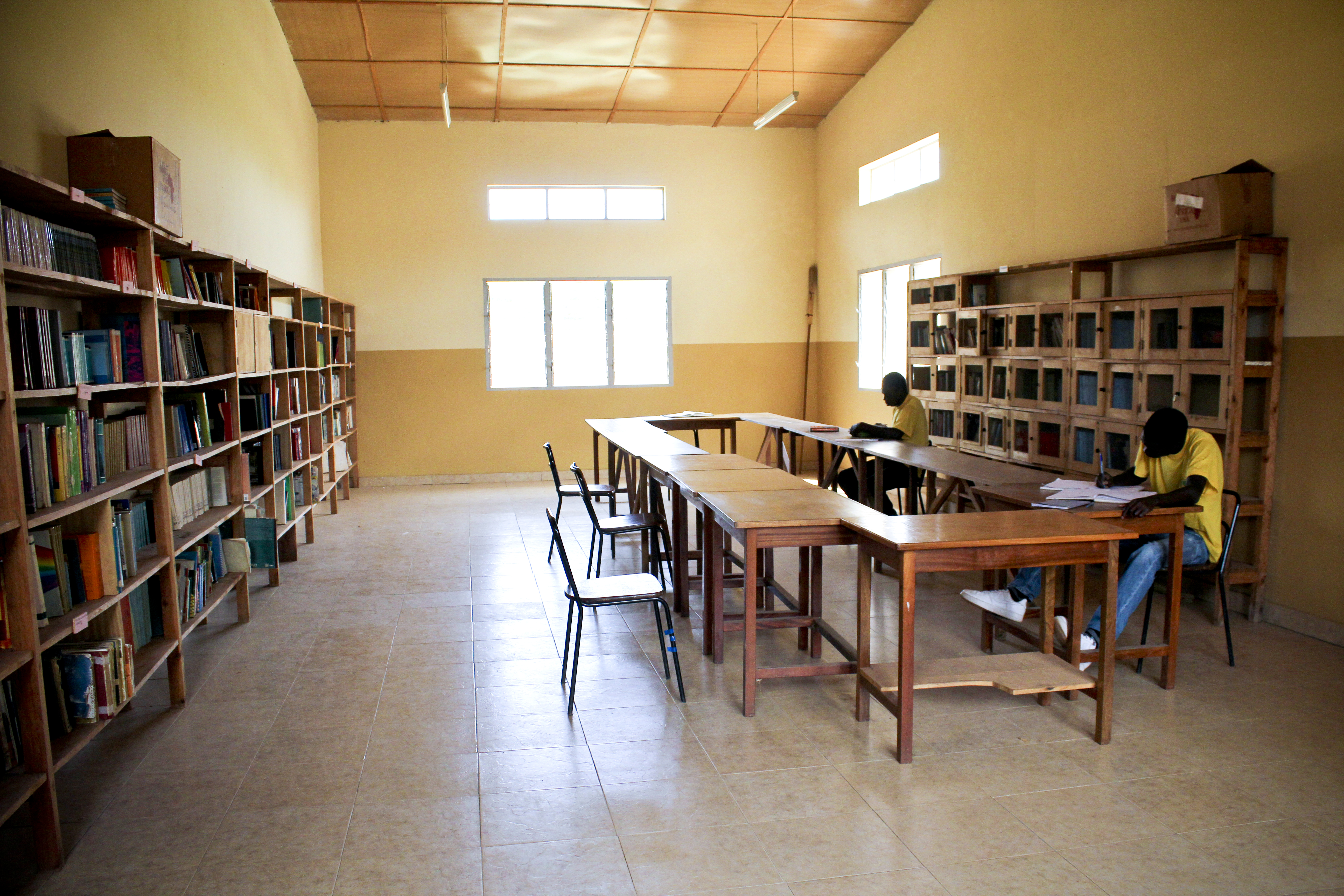 Students at the vocational school spend time doing homework in the school library.