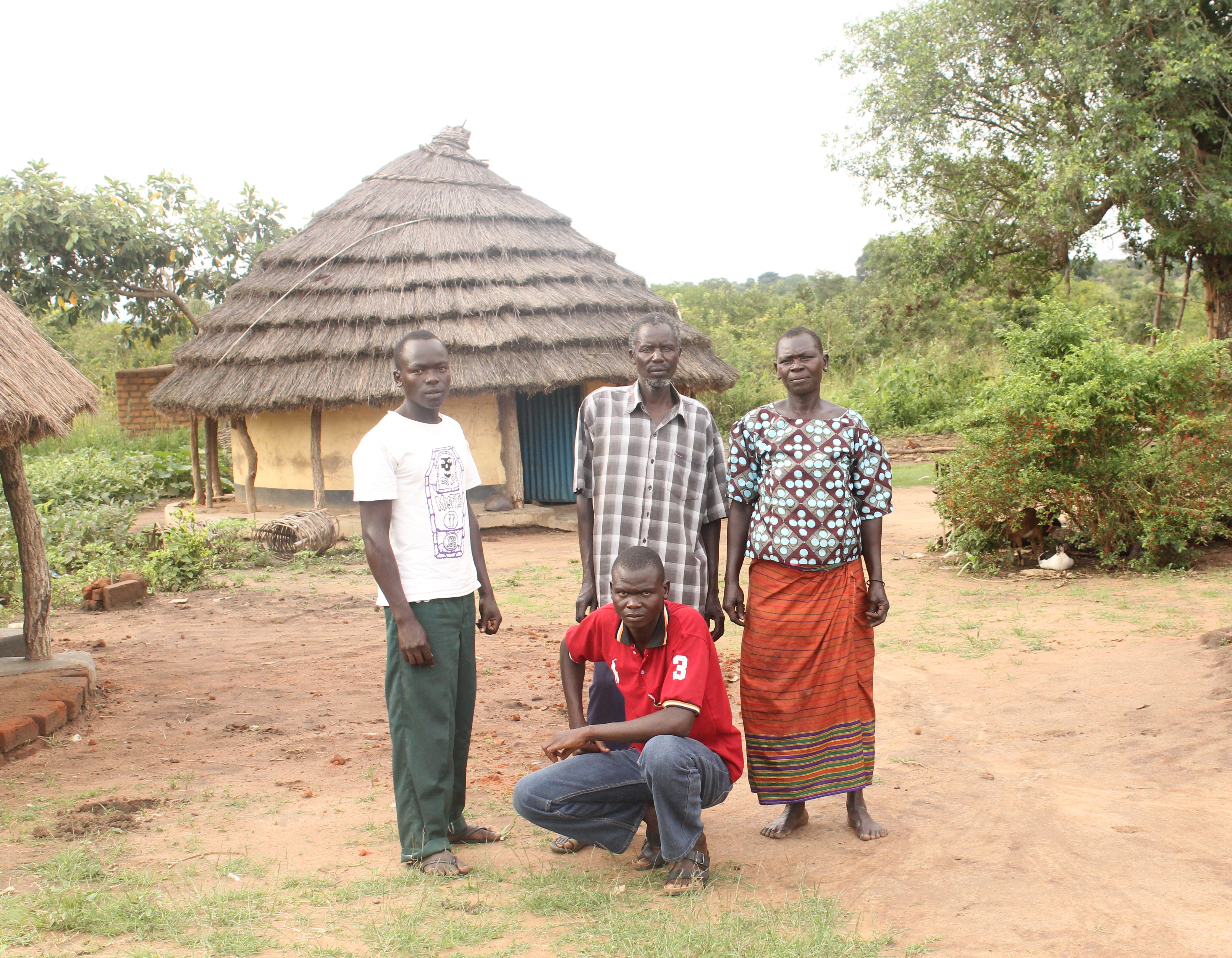 George with is brother, father and mother. 