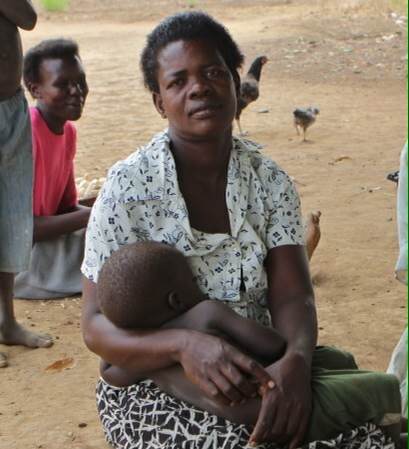 Ajok Christine sits with one of her sons near her home in Omot Sub-county in northern Uganda. The baby, Ogwang Roman, was born long after her son Bonny was abducted by the Lord’s Resistance Army. She hopes that Bonny will return home and the two can meet one day soon.
