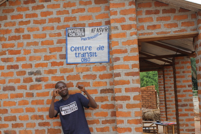 Miller, our Defection Program Field Assistant in CAR, busts a move during a stop to visit our partner Maman Marie Francine at the AFASVR Transit Center, which Invisible Children supports in Obo, CAR and provides care for recent LRA-escapees.