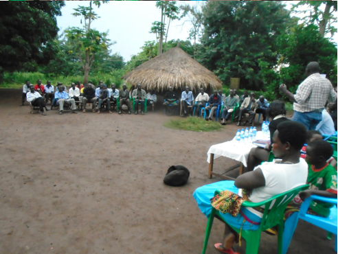 Agnes (foreground), at the welcome ceremony for the two children belonging to an LRA commander who were released from captivity with her. 